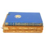 A.A. MILNE, TWO EARLY 20TH CENTURY LEATHER BOUND CHILDREN'S BOOKS Comprising two monogram edition