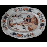 A LARGE 19TH CENTURY MASON'S IRONSTONE POTTERY MEAT PLATE Decorated with the willow pattern,
