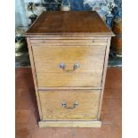 AN OAK TWO DRAWER FILING CABINET With brushing slide. (50cm x 66cm x 80cm) Condition: good