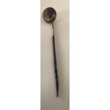 A 19TH CENTURY SCOTTISH SILVER BRANDY LADLE With treen twist handle.