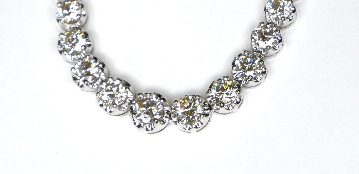 AN 18CT WHITE GOLD AND DIAMOND NECKLACE Having a single row of graduating round cut diamonds. ( - Image 3 of 3