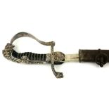 AN EARLY 20TH CENTURY GERMAN ARMY OFFICERS DRESS SWORD Having a lion mask handle and steel blade