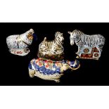 ROYAL CROWN DERBY, A COLLECTION OF FOUR PORCELAIN PAPERWEIGHTS 'Recumbent Zebra', made exclusively