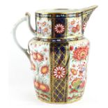 AN 18TH CENTURY CHAMBERLAIN'S WORCESTER PORCELAIN WATER JUG Hand painted with floral decoration in