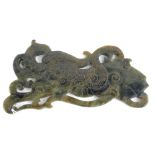 A CHINESE CARVED JADE PLAQUE OF A LION AND SERPENT Pierced and scrolled lion with a snake. Approx