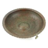 A COPPER ISLAMIC MAGIC MEDICINAL CIRCULAR BOWL With scrolled edge with engraved inscription