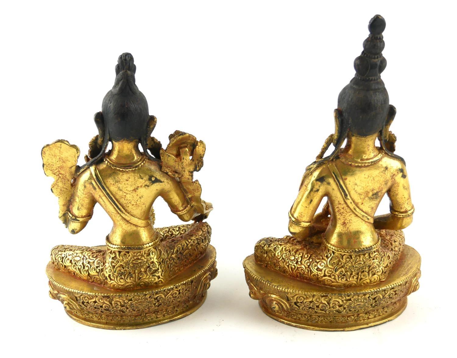 TWO CHINESE GILT BRONZE TARA GODDESS BUDDHA FIGURES Seated pose with flowers set to shoulders and - Image 2 of 2