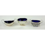 A COLLECTION OF VICTORIAN AND LATER SILVER AND BLUE GLASS SALTS Fluted salt hallmarked 1898, a