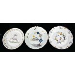 THREE 19TH CENTURY FAIENCE POTTERY PLATES Each hand painted with a different rustic image. (approx