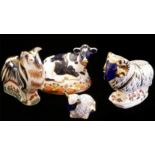 ROYAL CROWN DERBY, A COLLECTION OF FIVE PORCELAIN PAPERWEIGHTS Recumbent Cow 'Friesian Cow Buttercup