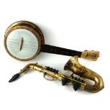 A VINTAGE SELCOL PLASTIC TOY BANJO Two tone plastic body with auto chord box and printed