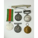 A COLLECTION OF WWI AND LATER BRITISH ARMY WAR MEDALS To include a silver WWI Defence medal and