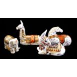 ROYAL CROWN DERBY, A COLLECTION OF FOUR PORCELAIN PAPERWEIGHTS 'Recumbent Llama', made exclusively