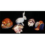 ROYAL CROWN DERBY, A COLLECTION OF FIVE PORCELAIN PAPERWEIGHTS 'Starlight Hare' made exclusively for
