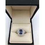 AN 18CT WHITE GOLD, SAPPHIRE AND DIAMOND RING (size O). (sapphire approx 1.80ct, diamond approx 0.