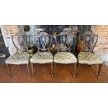 A SET OF FOUR EDWARDIAN DINING CHAIRS EDWARDIAN STAINED BEECHWOOD DINING CHAIRS The pierced shield