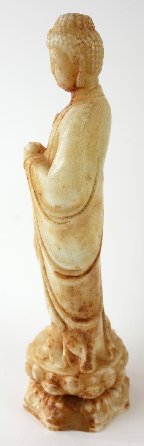 A CHINESE WHITE RUSSET JADE BUDDHA STATUE Standing pose on double lotus base. (approx 23cm) - Image 3 of 5