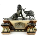 AN ART DECO SPELTER AND MARBLE GIRL AND DEER FIGURAL GARNITURE SET Set with a seated girl with two