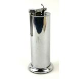 PARKER ROLLER BEACON, AN ART DECO CHROME CYLINDRICAL TABLE LIGHTER With lift up strike arm, pat