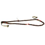 A CHINESE CARVED NUT AND HARD STONE BEAD NECKLACE The single strand interspersed with coral and