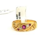AN 18CT GOLD, RUBY AND DIAMOND RING (size N).