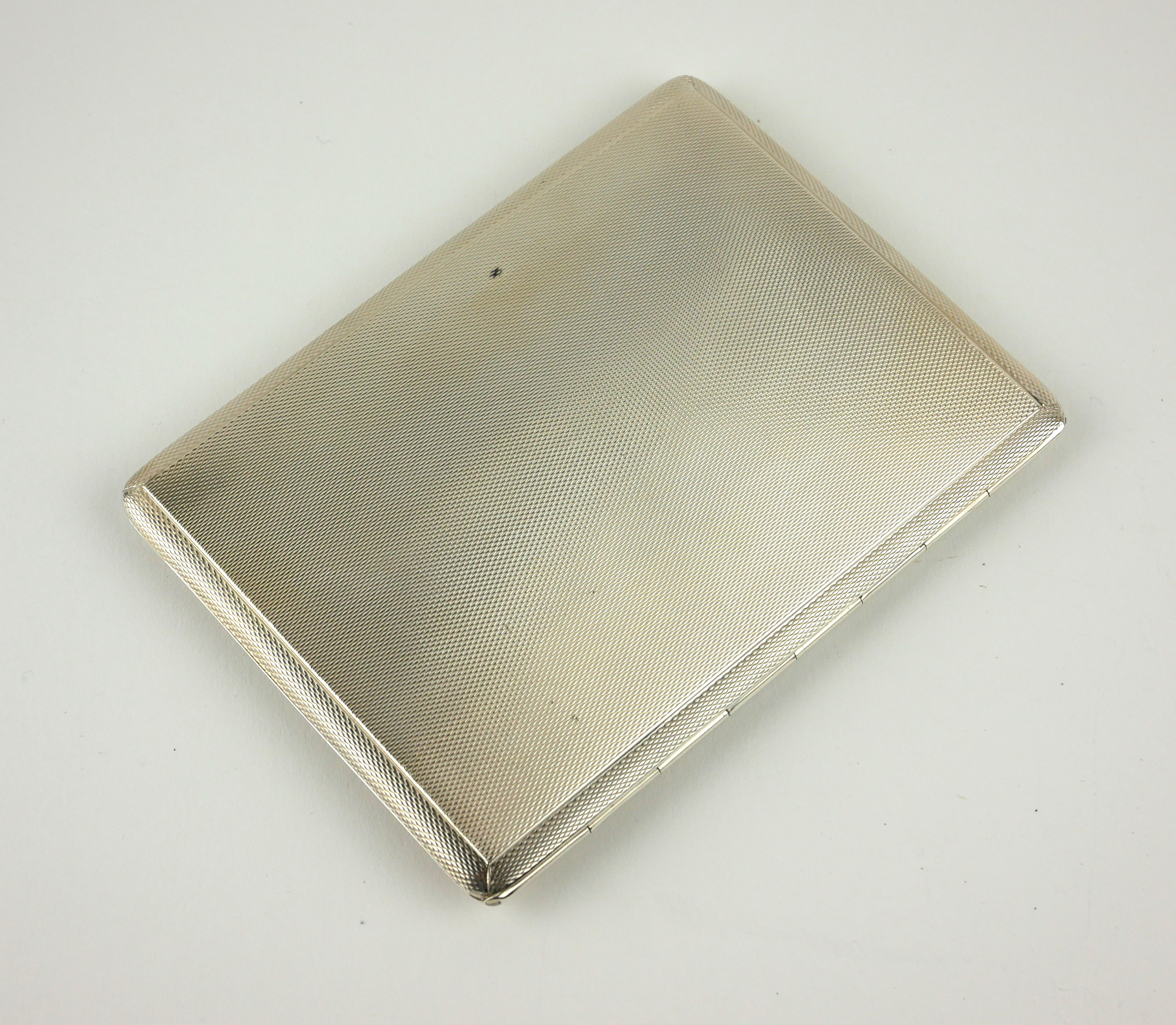 AN EARLY 20TH CENTURY SILVER CIGARETTE CASE Heavy gauge with engine turned decoration, hallmarked - Image 2 of 5