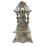 A CHINESE BRONZE BUDDHA Seated pose with pierced back and square form base. (approx 32cm)