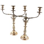 A PAIR OF 19TH CENTURY SHEFFIELD PLATE CANDELABRA Twin arms with acanthus leaf decoration. (approx