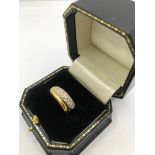 AN 18CT GOLD AND BRILLIANT CUT DIAMOND PAVE SET RING (size K½). (approx diamond 1ct)