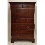 A GEORGE III MAHOGANY CHEST ON CHEST With two short over six long drawers with brass swan neck