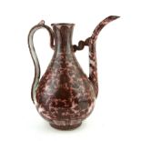 A CHINESE COPPER RED GLAZE PORCELAIN BALUSTER EWER With underglaze floral decoration and red