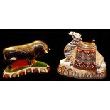 ROYAL CROWN DERBY, TWO PORCELAIN PAPERWEIGHTS 'Bull LV', 'Recumbent Camel L1X', both decorated in