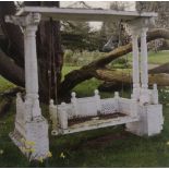 AN EARLY/MID 20TH CENTURY INDIAN PLANTATION WOODEN GARDEN SWING The canopy supported by four