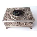 A LATE 19TH/EARLY 20TH CENTURY GERMAN SILVER SINGING BIRD MUSIC BOX Having embossed figural