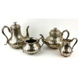 ELKINGTON, A VICTORIAN SILVER PLATED FOUR PIECE TEA SERVICE Comprising a teapot, coffee pot, twin