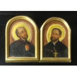 A PAIR OF LATE 19TH CENTURY CONTINENTAL SCHOOL OILS ON CANVAS Saintly figures, later laid to