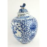 A CHINESE BLUE AND WHITE GINGER JAR With hand painted cartouche of figures in a garden within a