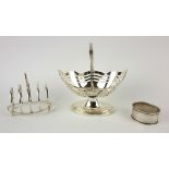 A VICTORIAN SILVER SWEETMEAT BASKET Scallop form with pierced gallery, hallmarked Chester, 1897,