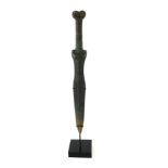 A CHINESE BRONZE DAGGER Having opposing mythical beasts to handle, on black perspex stand. (approx