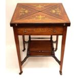 AN EDWARDIAN ROSEWOOD AND MARQUETRY INLAID ENVELOPE CARD TABLE The top decorated with urns and