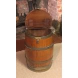 A VICTORIAN BRASS BOUND BARREL With rise and fall top and heavy brass fittings. (35cm x 49cm)