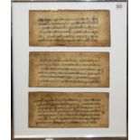 A TIBETAN INK CALLIGRAPHY ON PAPER MANUSCRIPT Three rectangular form panels in one mount, framed and