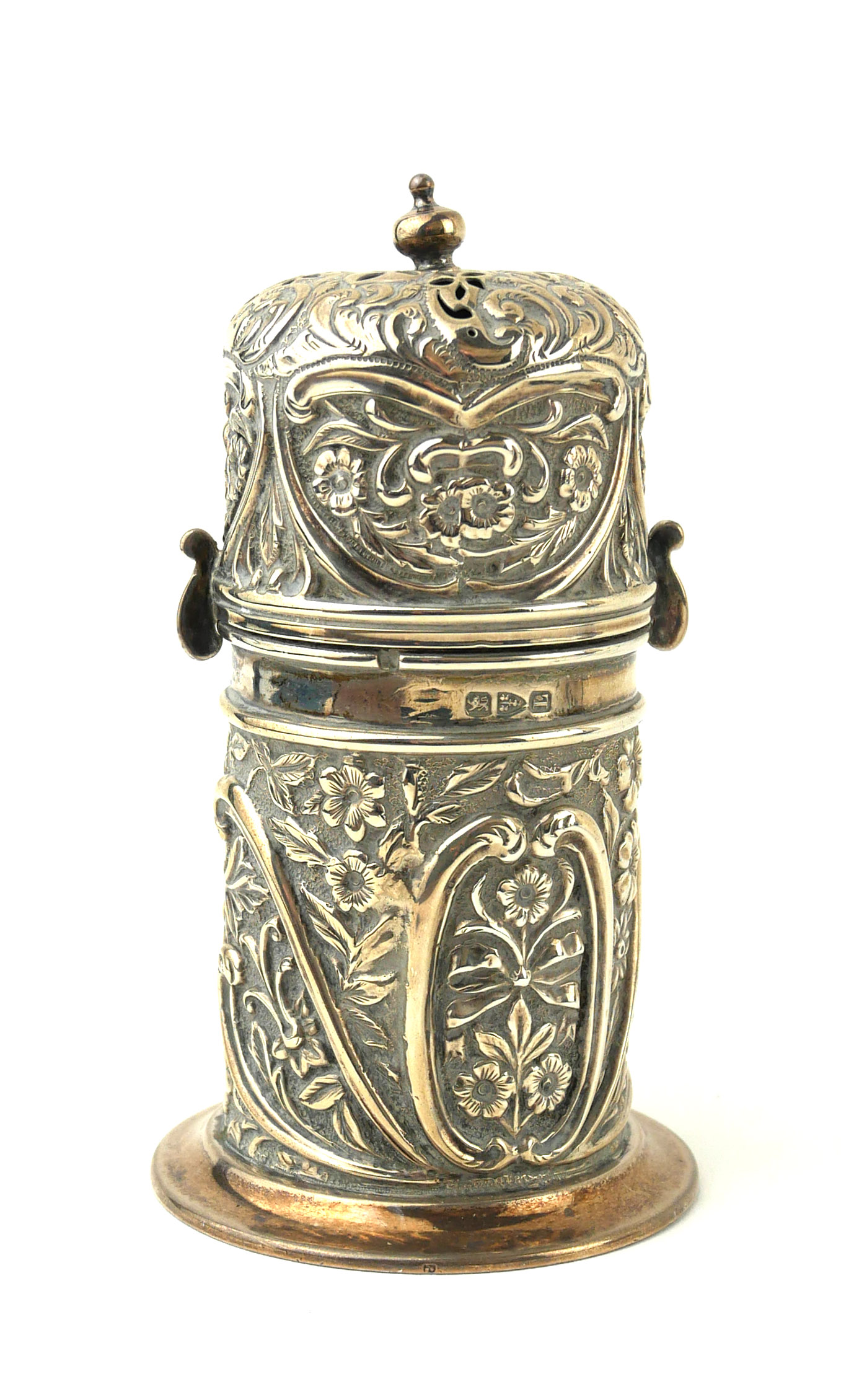 A VICTORIAN SILVER SUGAR CASTOR Having a pierced dome top and embossed decoration, hallmarked