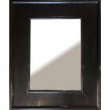 A CONTEMPORARY DEEP CUSHION LACQUERED FRAMED MIRROR With bevelled plate along with another. (87cm