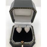 A PAIR OF 18CT WHITE GOLD AND PAVÉ DIAMOND SET HEART FORM EARRINGS (size M).