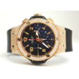 HUBLOT, BIG BANG, AN 18CT GOLD AND DIAMOND GENT'S CHRONOGRAPH WRISTWATCH With textured black dial,