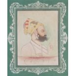 A 19TH CENTURY INDIAN MAHARAJA WATERCOLOUR PORTRAIT Profile portrait of a Sikh Maharaja wearing a