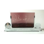 AN ART DECO CHROME AND COLOURED GLASS DESK LAMP The rectangular purple glass panel etched with a