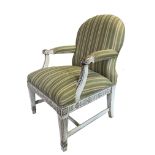 MANNER OF HENRY HOLLAND, A 19TH CENTURY ENGLISH PAINTED AND CARVED WOOD UPHOLSTERED OPEN ARMCHAIR