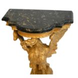 A FINE 18TH CENTURY GEORGE II PERIOD CARVED GILTWOOD CONSOLE TABLE The serpentine marble top